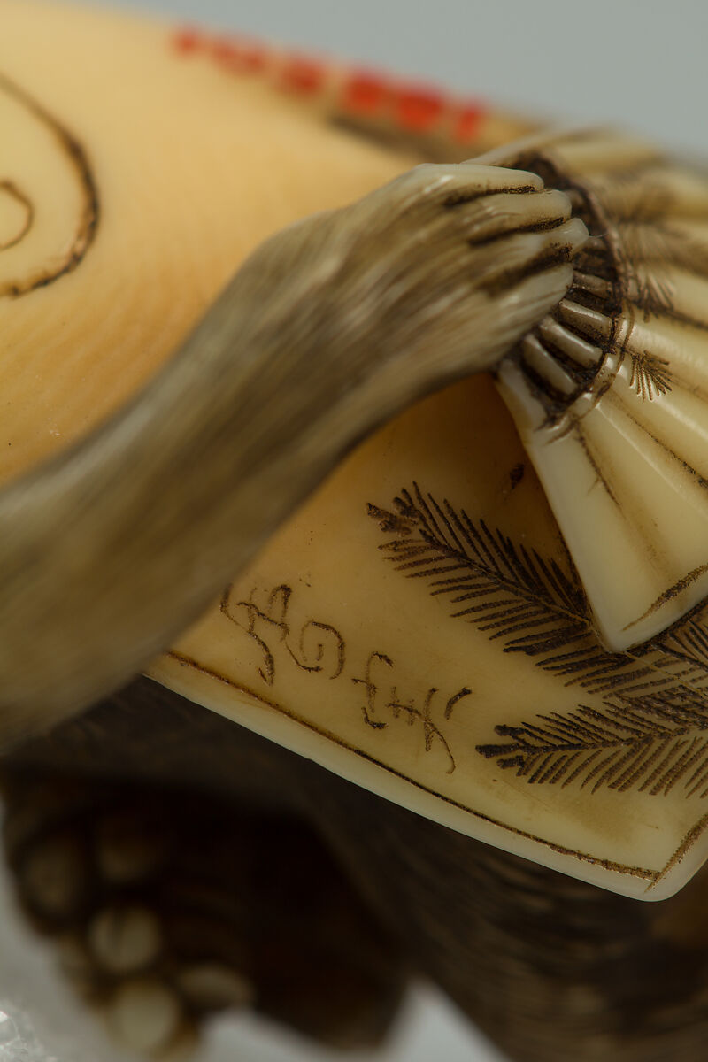 Netsuke of Monkey Wearing a Tall Cap and Carrying a Fan, Ivory, Japan