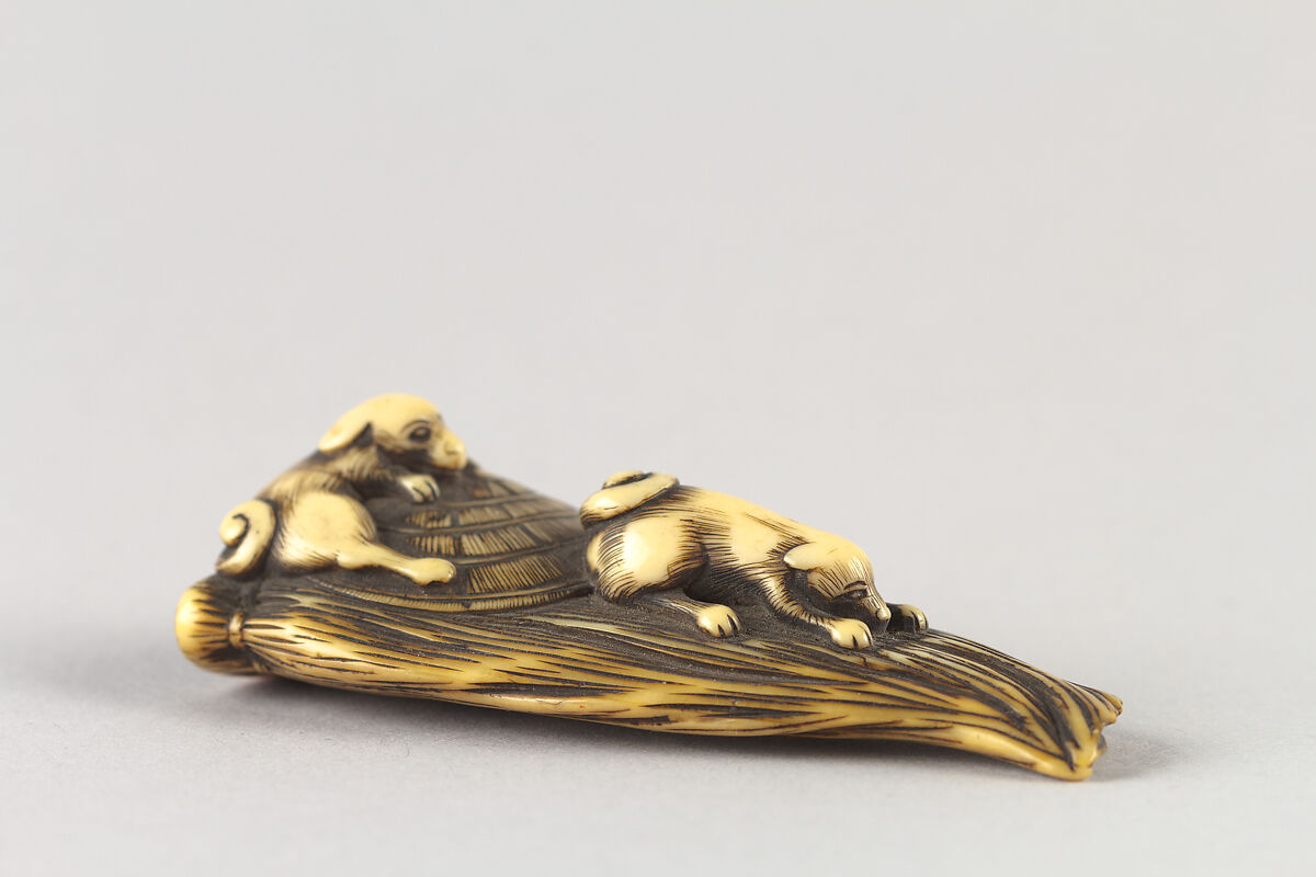 Netsuke of Puppies on a Bamboo Whisk, Ivory, Japan