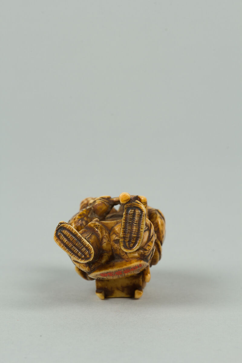 Netsuke of Old Man with a Pack on His Back, Ivory, Japan
