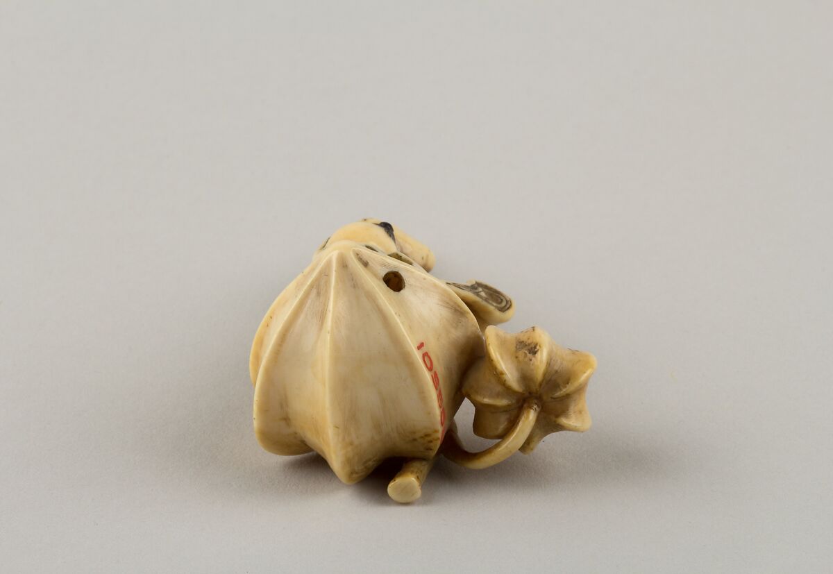 Netsuke of Boy Carrying a Branch of Fruit, Ivory, Japan