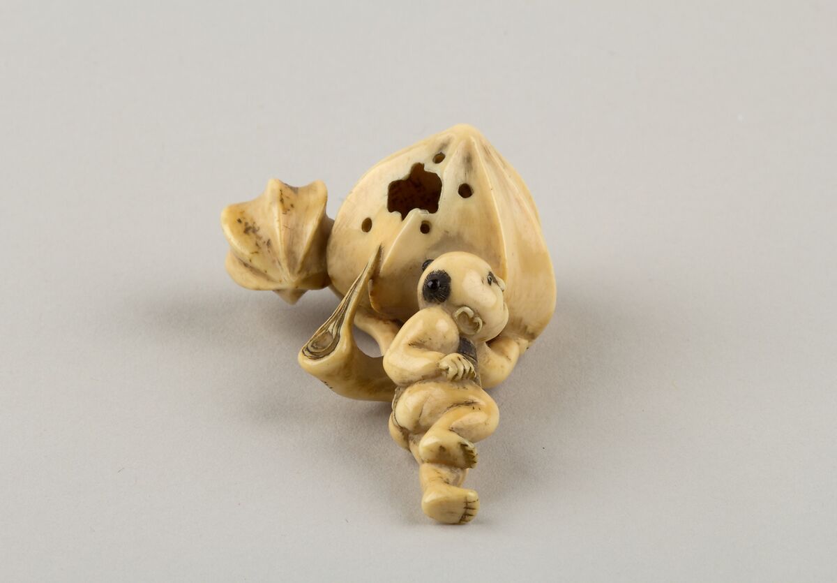 Netsuke of Boy Carrying a Branch of Fruit, Ivory, Japan