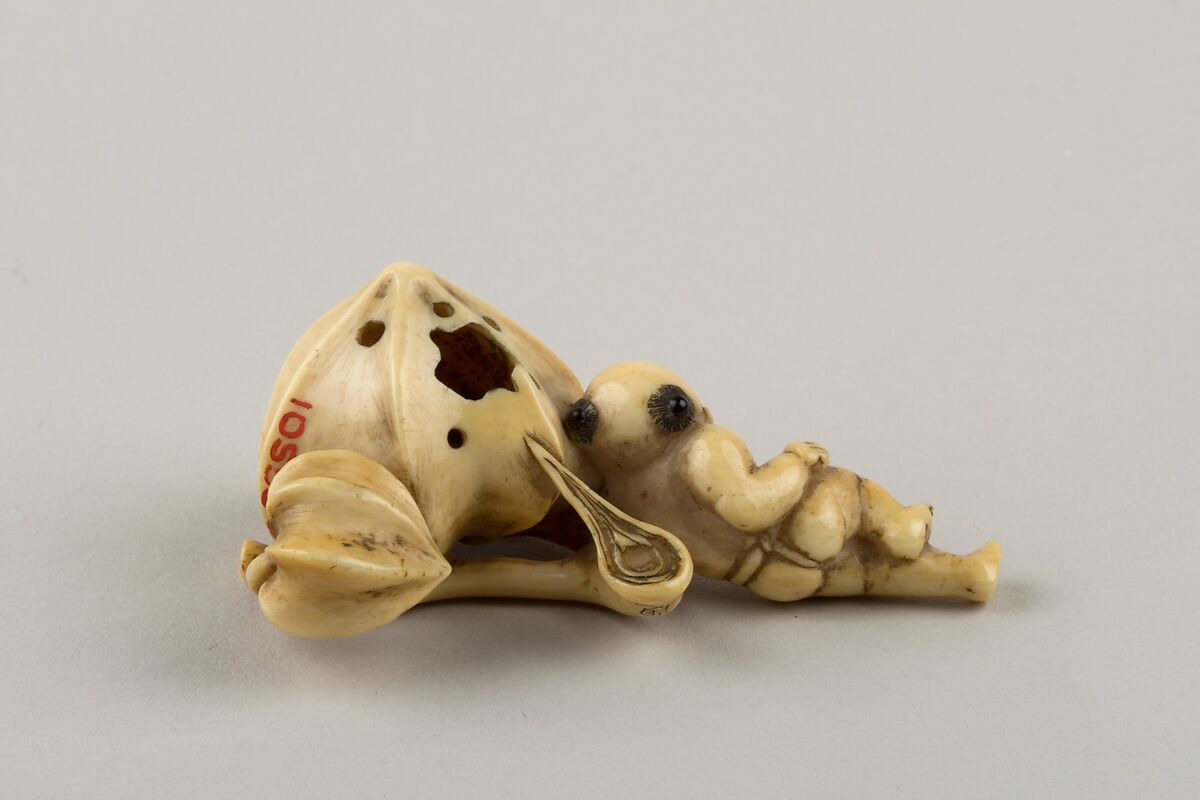 Netsuke of Boy Carrying a Branch of Fruit, Ivory, Japan