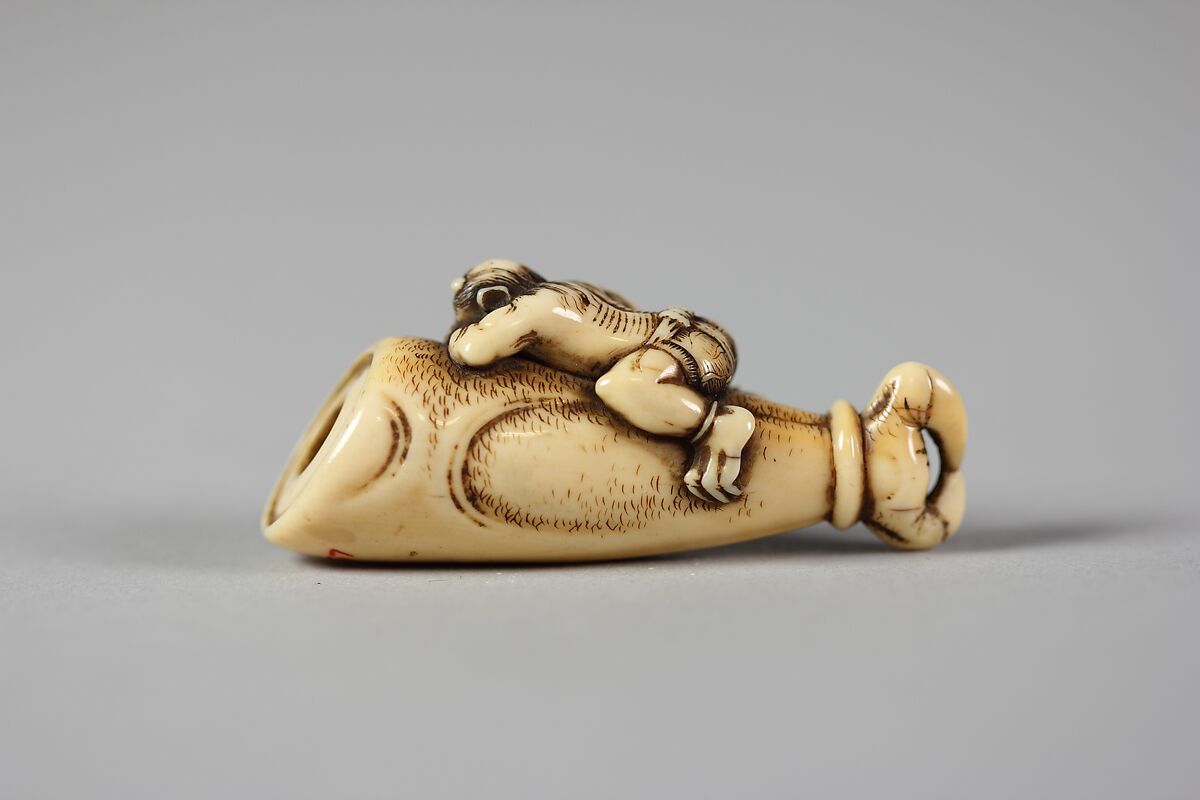 Netsuke of Hand and Forearm of a Demon with Small Demon on the Side, Ivory, Japan