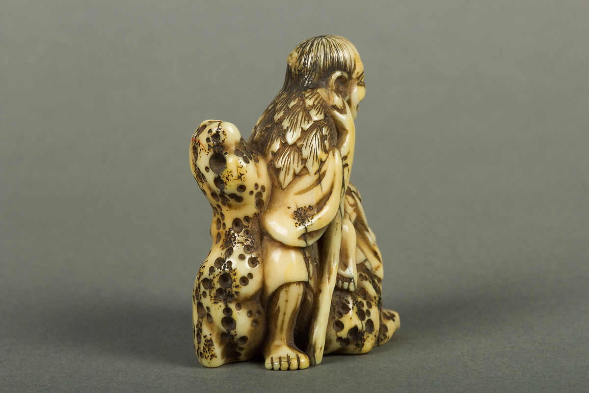 Netsuke of Old Man Sitting on a Rock, Ivory, Japan