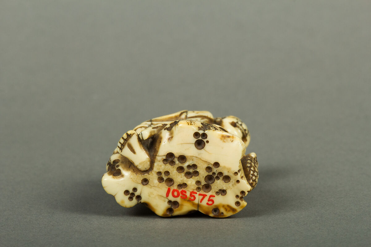 Netsuke of Old Man Sitting on a Rock, Ivory, Japan