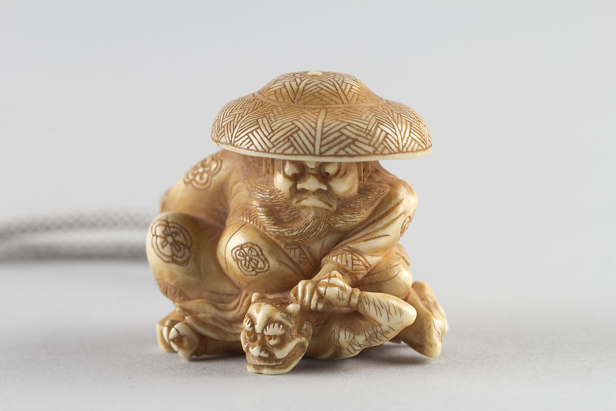 Netsuke of Shoki, the Demon-Queller, Carved ivory, Japan 