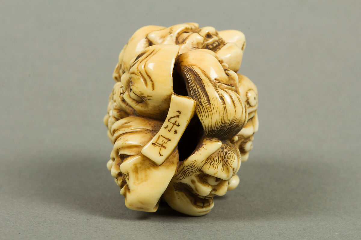 Netsuke of Thirteen Masks, Ivory, Japan