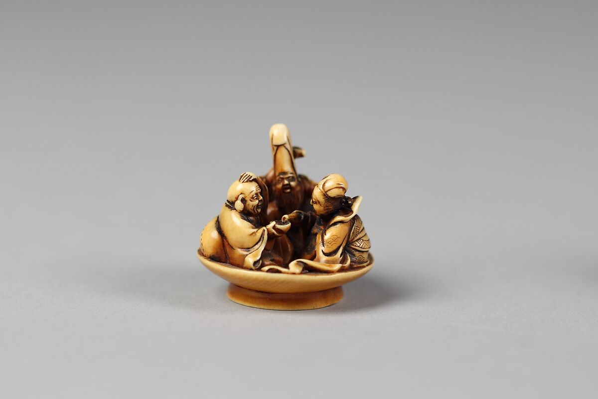 Netsuke of Fukurokujin, Hotei and Benten in Sake Dish, Ivory, Japan 