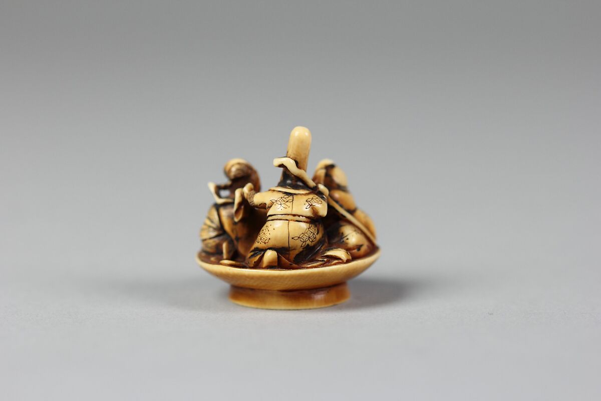Netsuke of Fukurokujin, Hotei and Benten in Sake Dish, Ivory, Japan