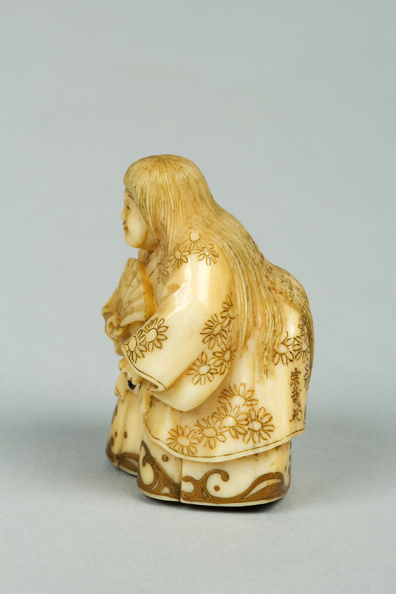 Netsuke, Ivory with gold lacquer ornamentation, Japan