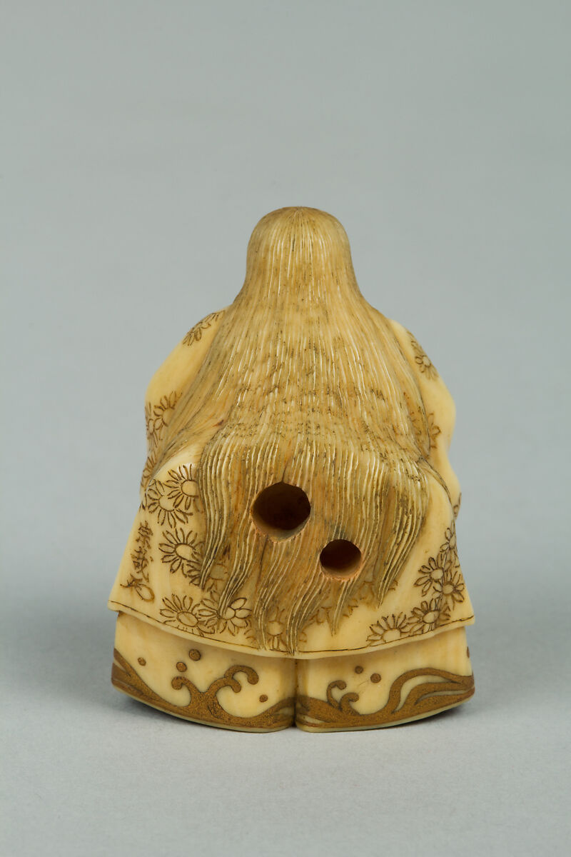 Netsuke, Ivory with gold lacquer ornamentation, Japan