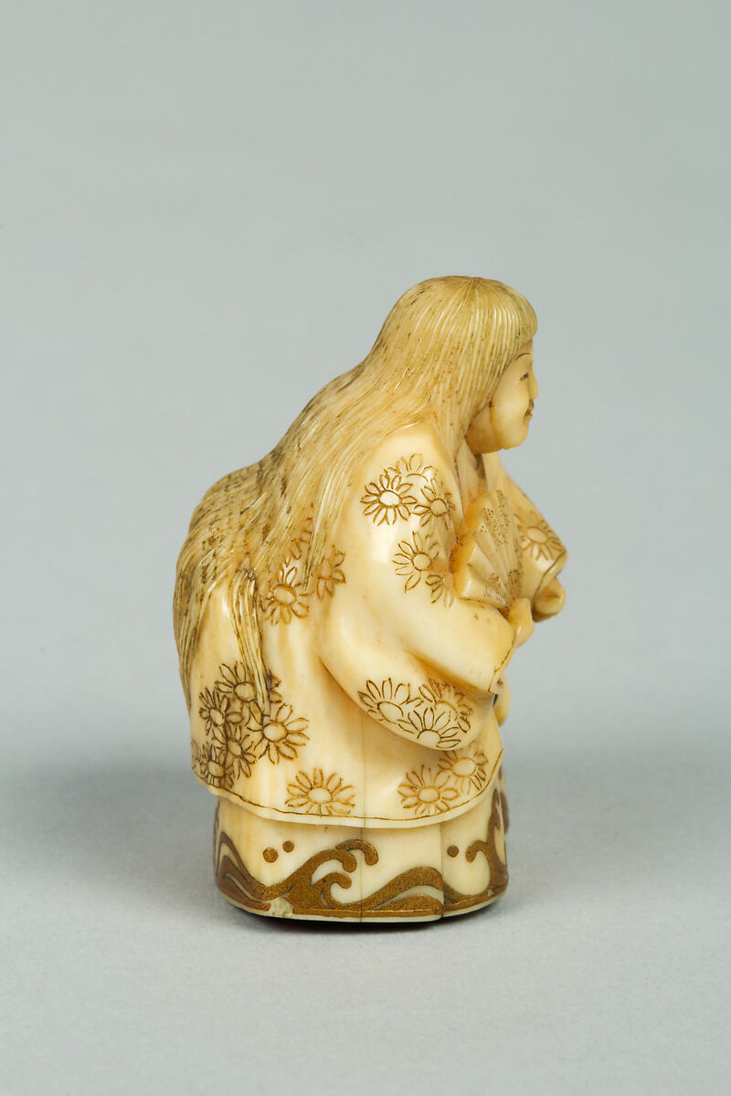Netsuke, Ivory with gold lacquer ornamentation, Japan