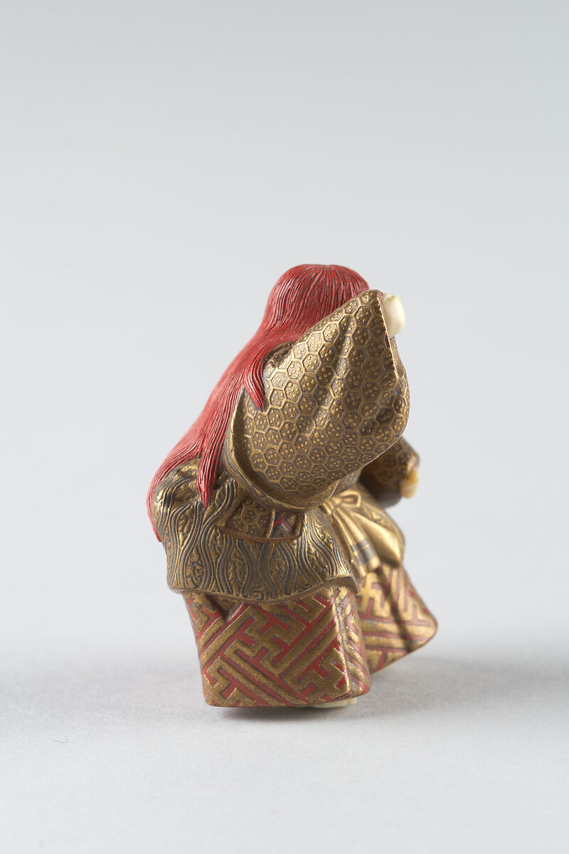 Netsuke of Shakkyō Dancer, Ivory and lacquered wood with gold and color hiramaki-e, Japan