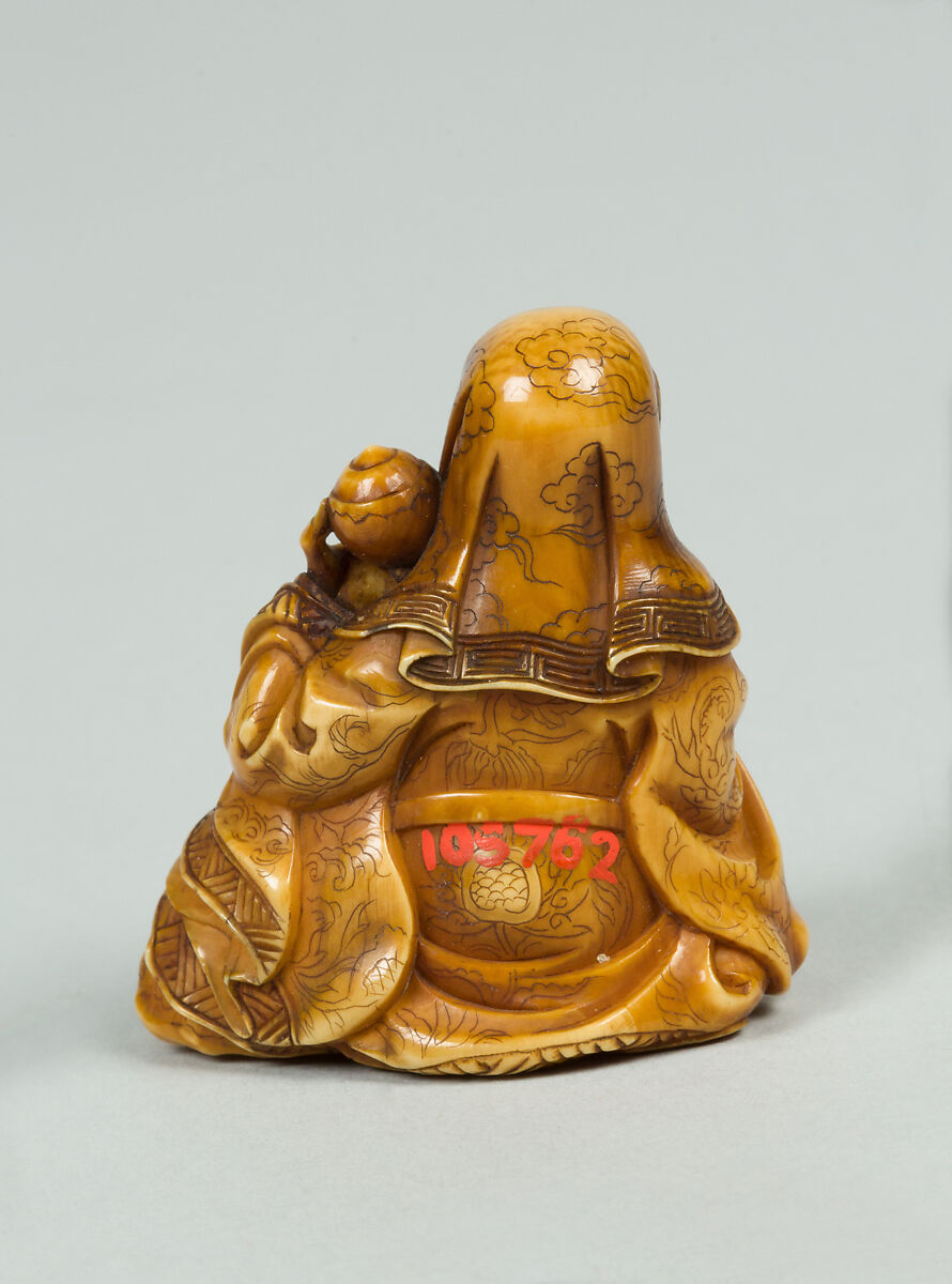 Netsuke of Old Man and Stork, Ivory, Japan
