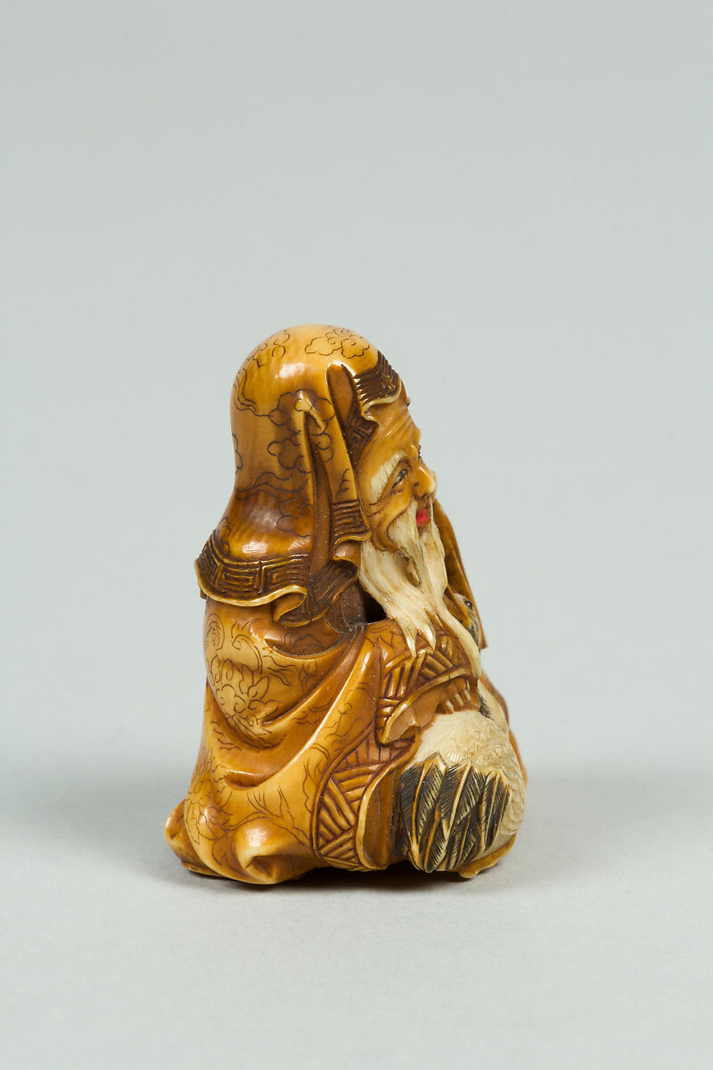 Netsuke of Old Man and Stork, Ivory, Japan