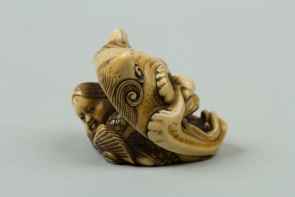 Netsuke of Okame under a Demon Mask, Ivory, Japan