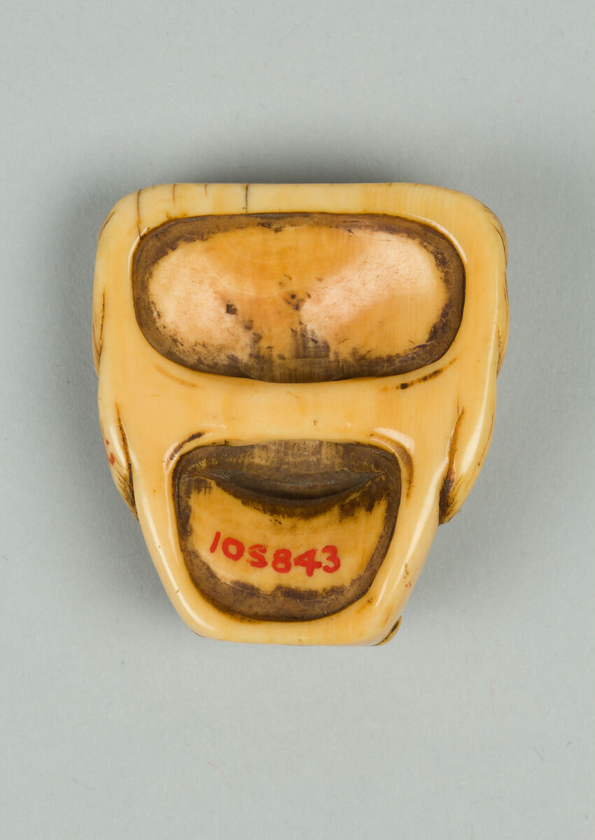 Netsuke of Mask of a Man with Open Mouth and Curly Hair, Ivory, Japan