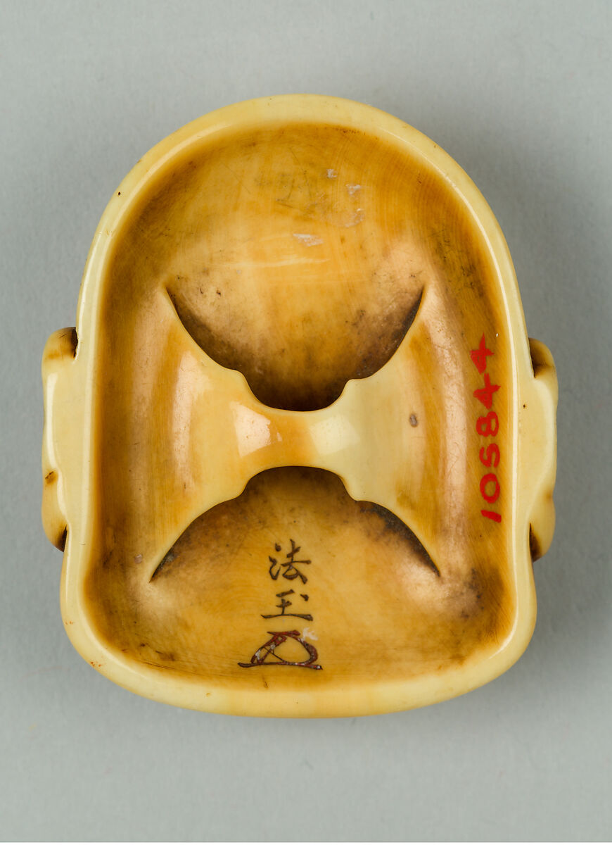 Netsuke of Mask of a Man, Ivory, Japan