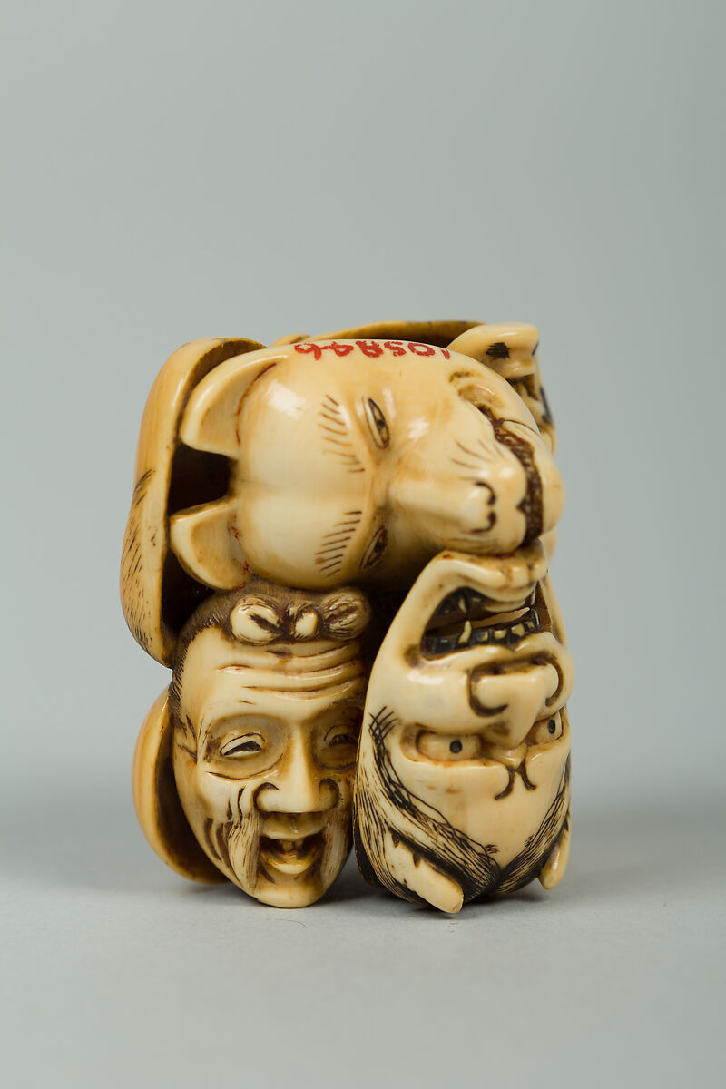 Netsuke of Group of Noh Masks, Ivory, Japan