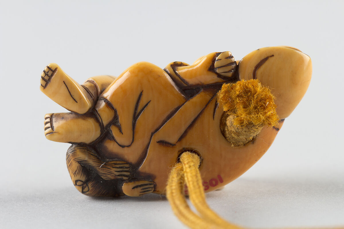 Netsuke of a Man Sleeping while Monkey Steals Contents of Basket, Ivory, Japan