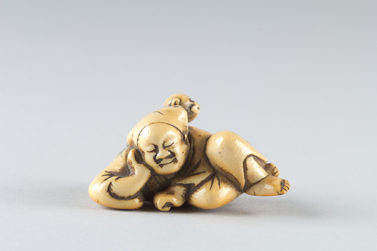 Netsuke of a Man Sleeping while Monkey Steals Contents of Basket, Ivory, Japan 