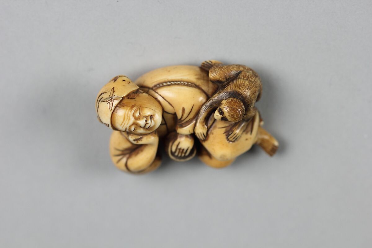 Netsuke of Sleeping Man and a Monkey, Ivory, Japan 