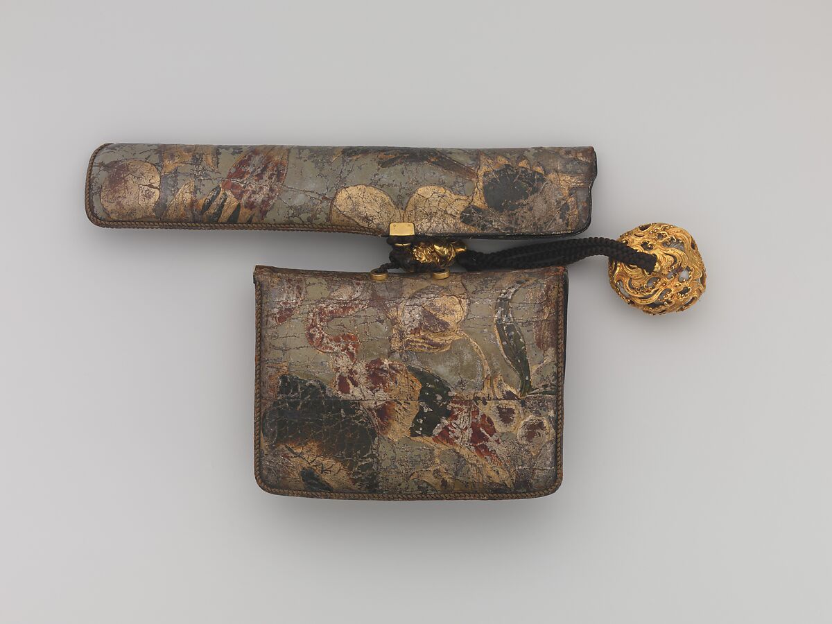 Tobacco Pouch and Pipe with Netsuke of Freshwater Pearl in Gold Mount, Pouch: Dutch embossed leather with silver foil, and color
Clasp: gold, shakudō and shibuichi
Ojime: gold
Netsuke: freshwater pearl and gold
Pipe: metal
Pipe case: Dutch embossed leather with silver foils, and color, Japan