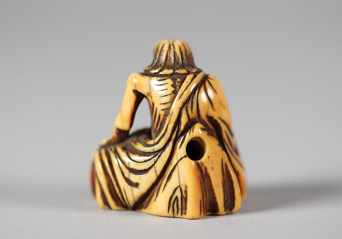 Netsuke of Old Man Seated on a Rock, Ivory, Japan
