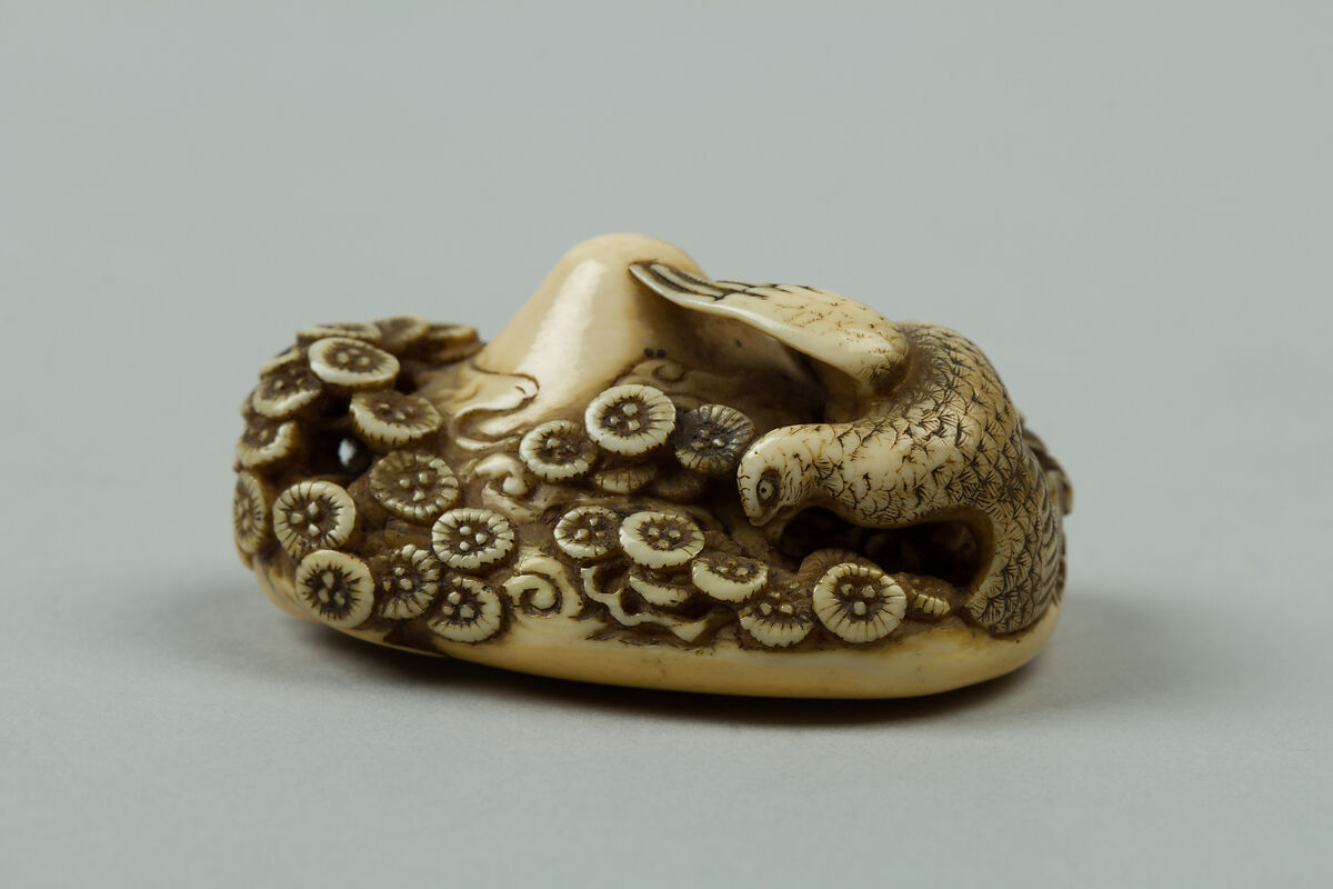 Netsuke of Mountain with Flowers and a Bird, Ivory, Japan 