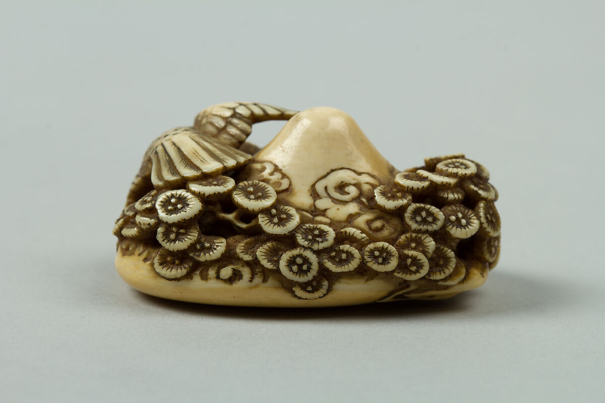 Netsuke of Mountain with Flowers and a Bird, Ivory, Japan