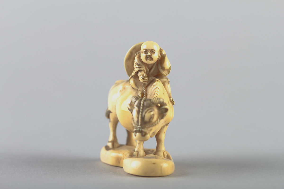 Netsuke of Boy on a Cow, Ivory, Japan