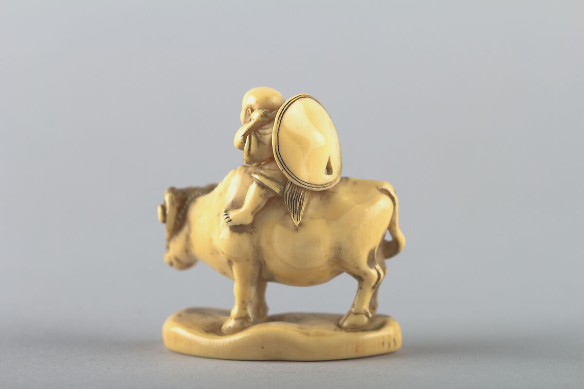 Netsuke of Boy on a Cow, Ivory, Japan