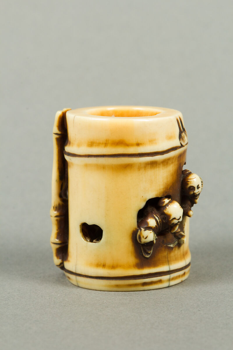 Netsuke of Section of Bamboo Containing Two Men, Ivory, Japan