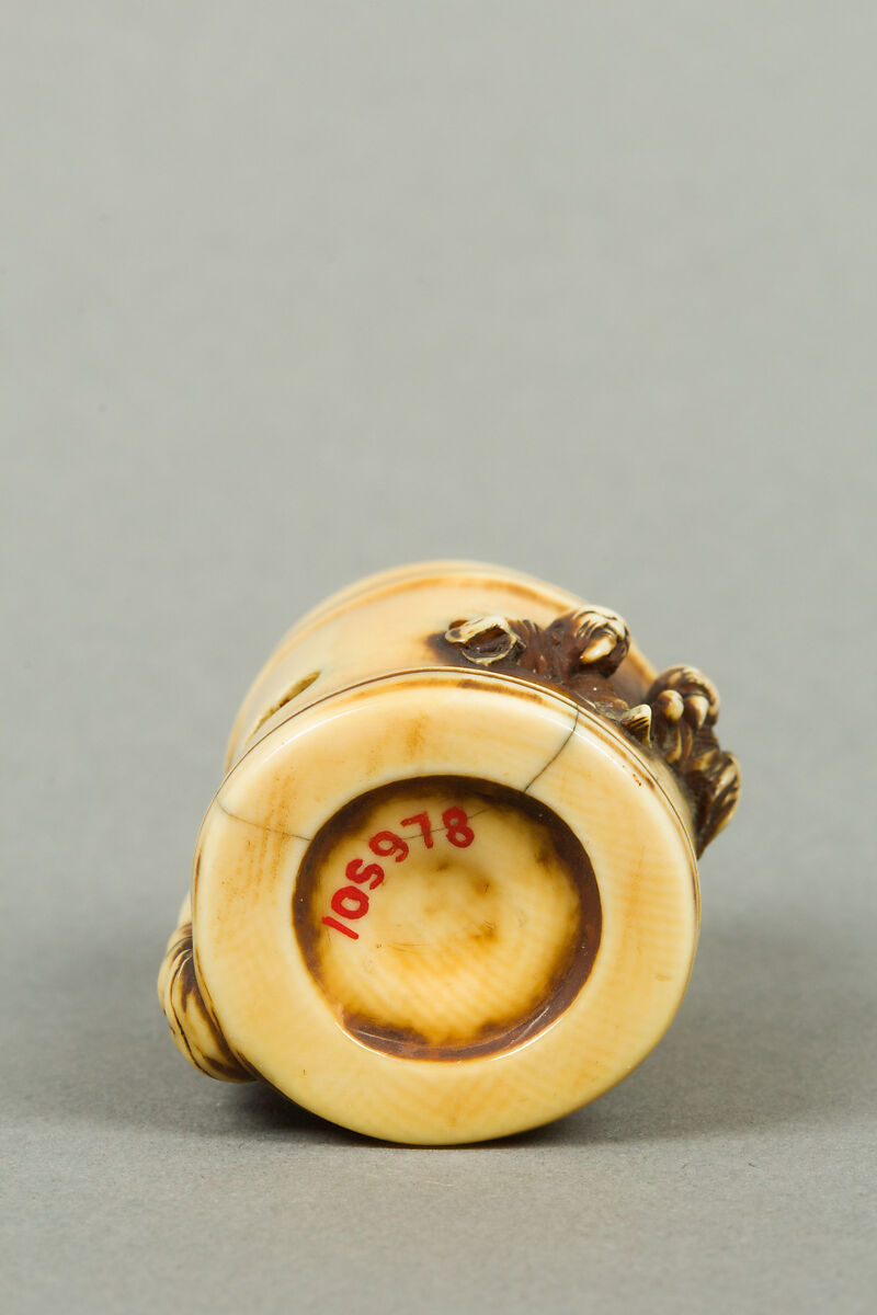 Netsuke of Section of Bamboo Containing Two Men, Ivory, Japan