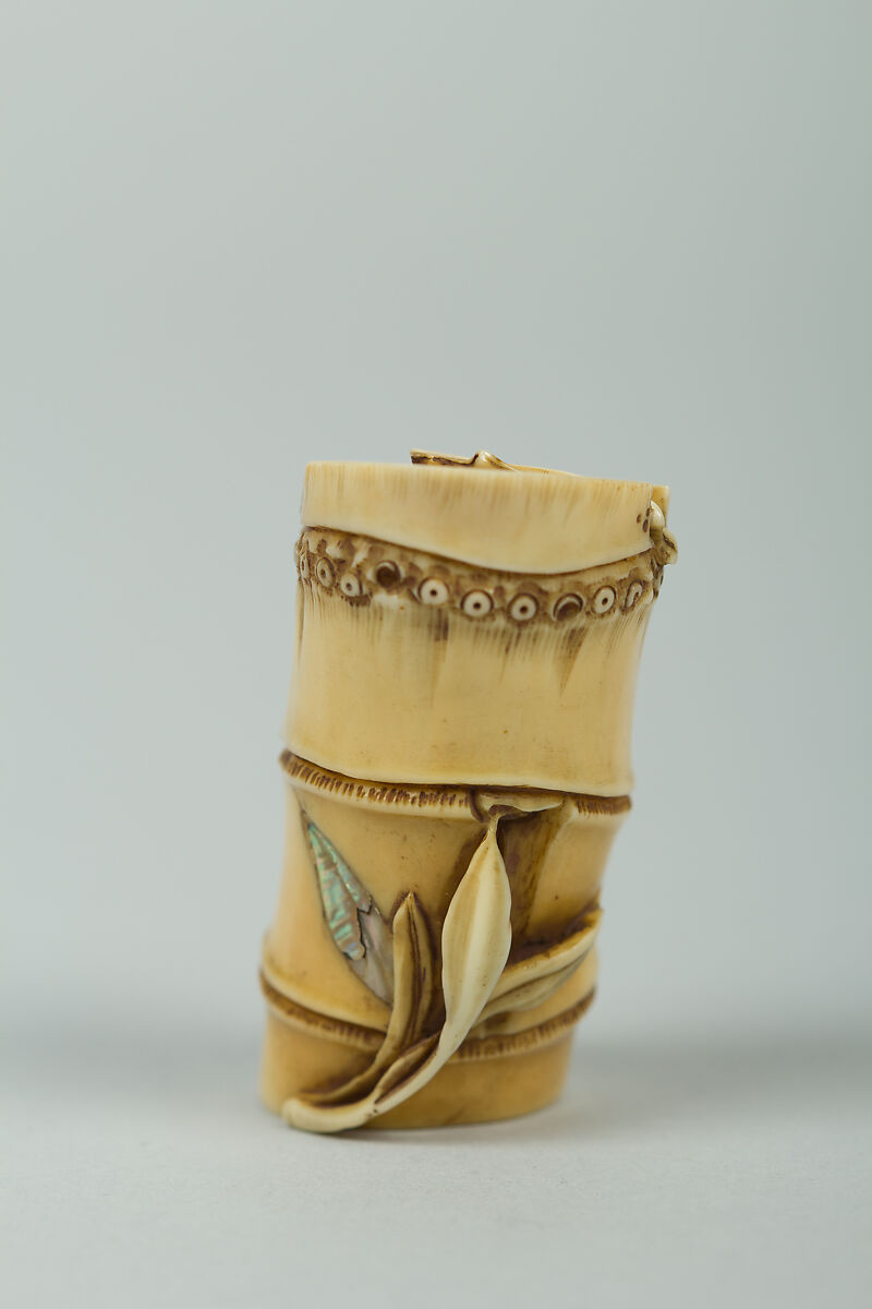 Netsuke of Piece of Bamboo Containing a Rat (or Bat (?), Ivory, Japan 
