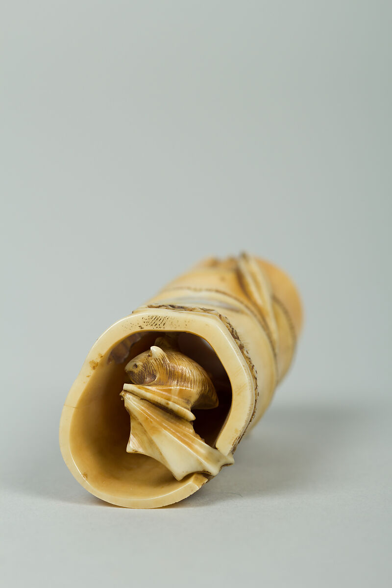 Netsuke of Piece of Bamboo Containing a Rat (or Bat (?), Ivory, Japan