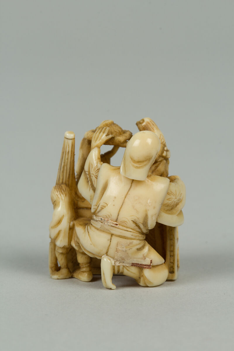 Netsuke of Man Training Birds, Ivory, Japan
