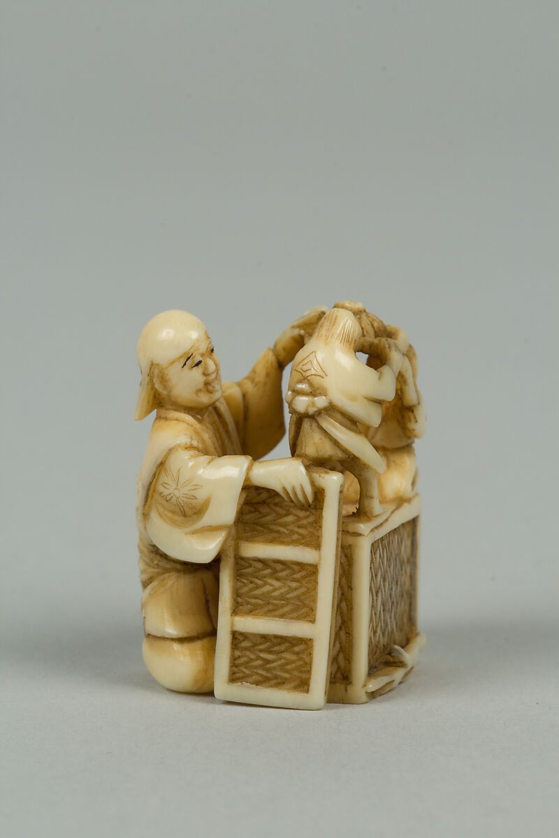 Netsuke of Man Training Birds, Ivory, Japan