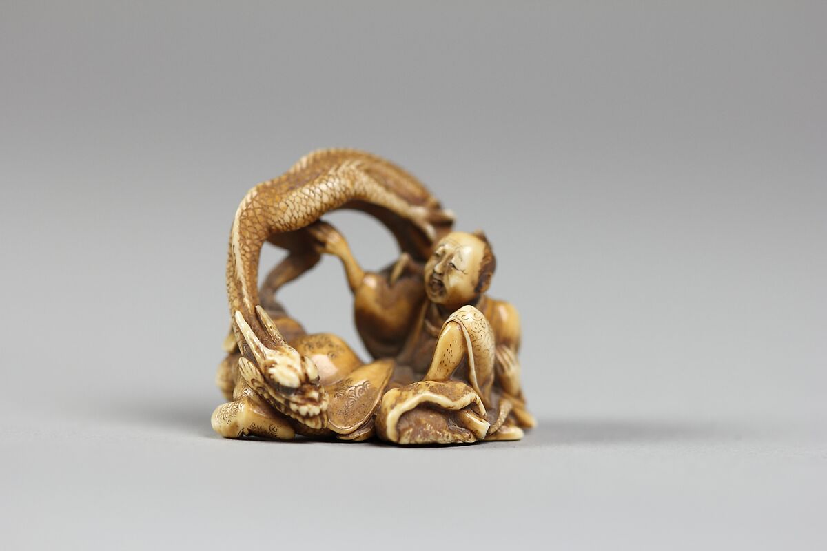 Netsuke of Two Figures and a Dragon, Ivory, Japan 