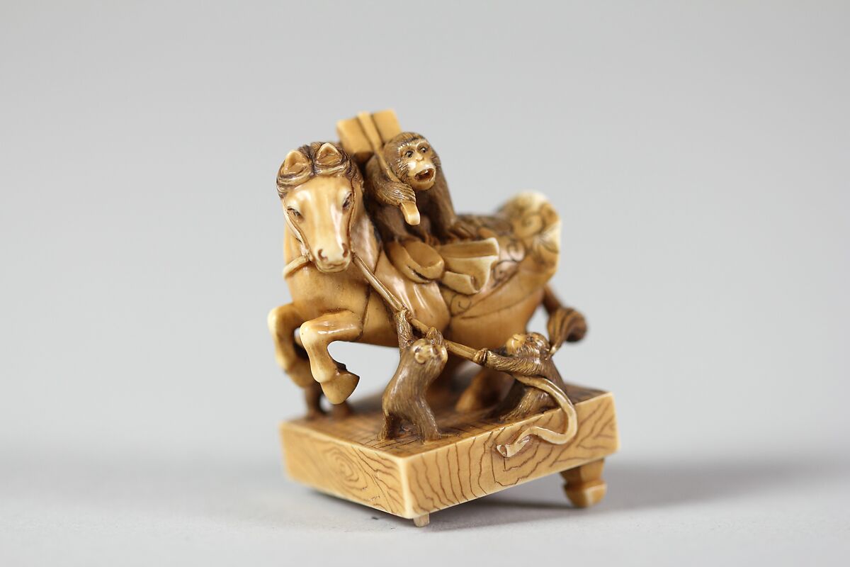 Netsuke of a Horse on a Pedestal with Monkeys Playing About, Ivory, Japan 