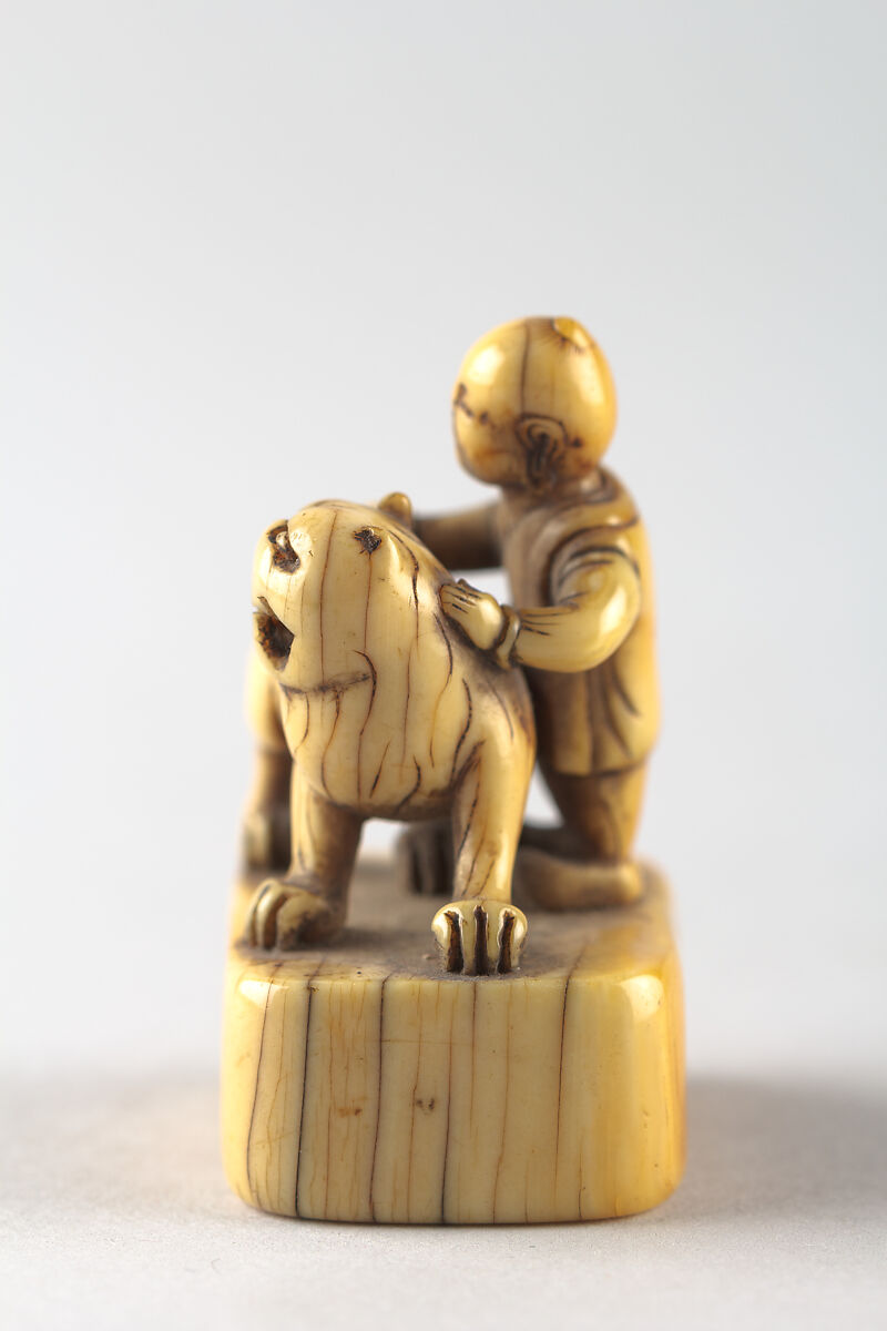 Netsuke of Boy with Dog, Ivory, Japan