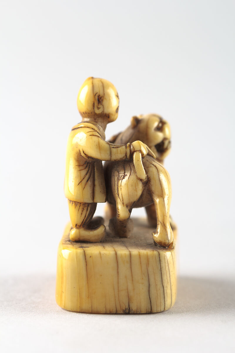 Netsuke of Boy with Dog, Ivory, Japan