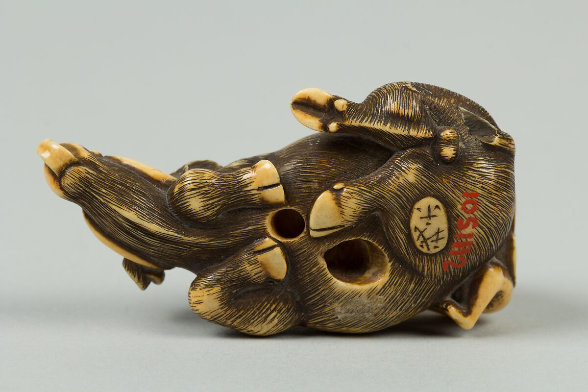 Netsuke of Boy Climbing over the Back of a Cow, Ivory, Japan