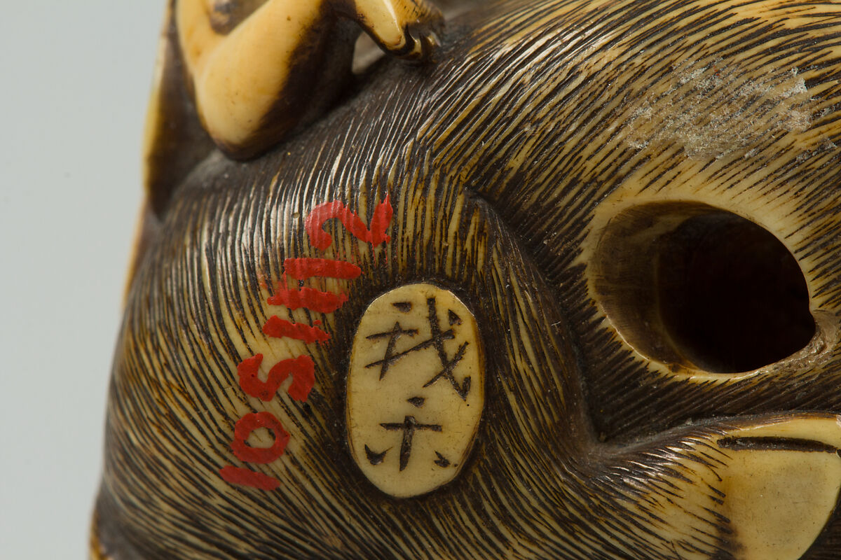 Netsuke of Boy Climbing over the Back of a Cow, Ivory, Japan