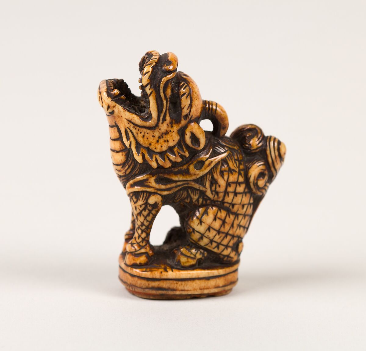 Netsuke and Seal in form of a Qilin, Ivory, Japan 