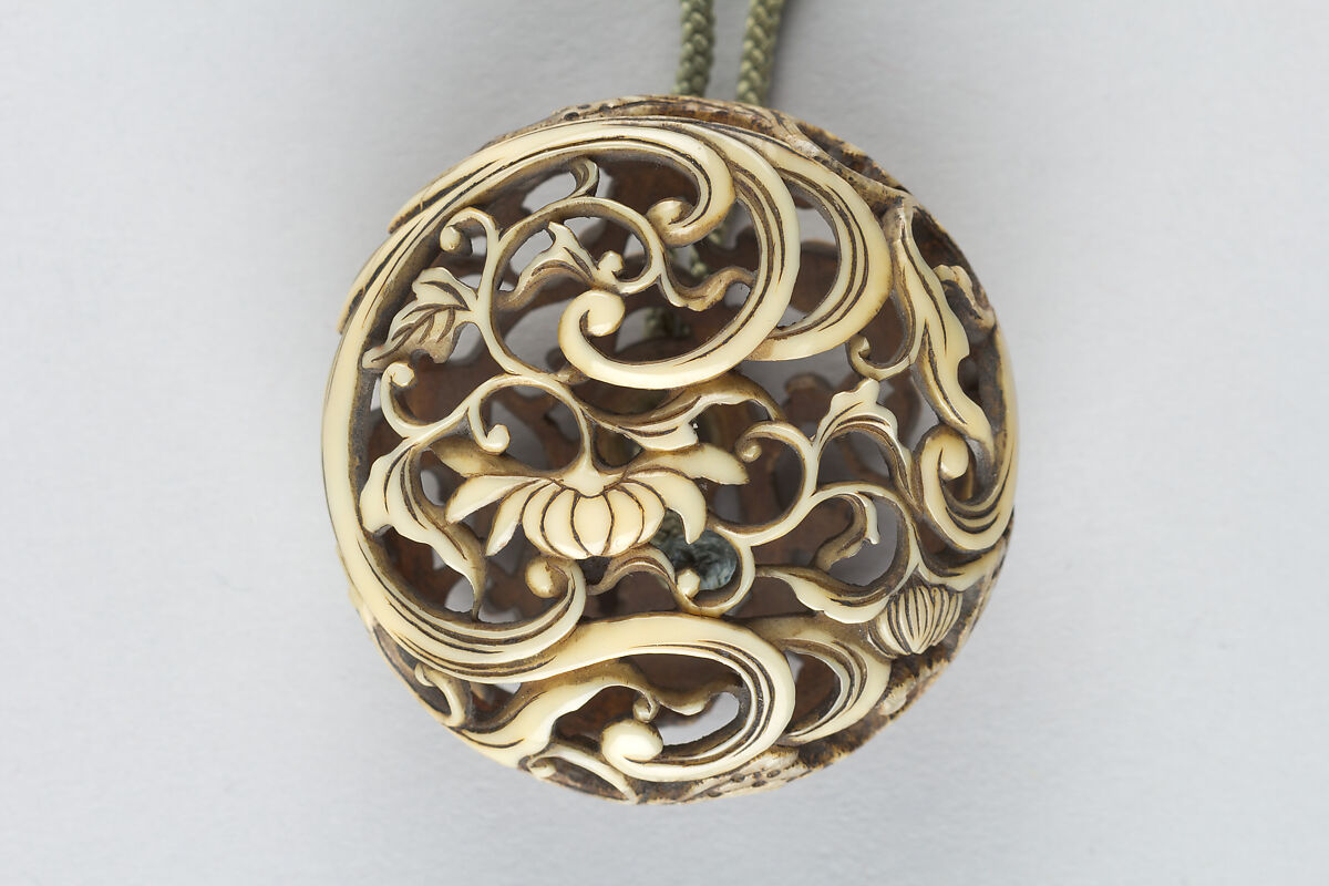 Netsuke of Water and Chrysanthemum (Kikusui), Ivory carved in openwork, (Ryūsa), Japan 