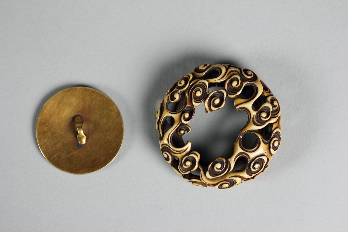 Netsuke of Peasant and Child Loading a Boat, Ivory with metal disc; gold in katakiri, Japan