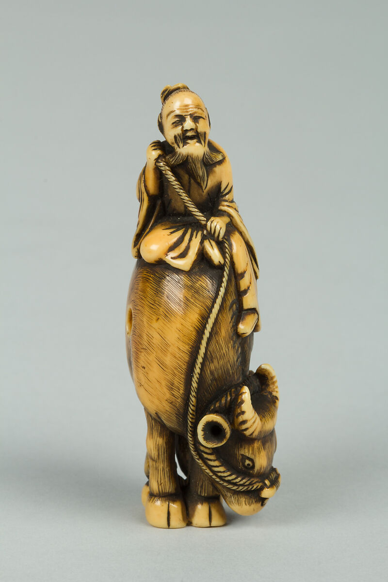 Netsuke of Man Riding a Buffalo, Ivory, Japan 