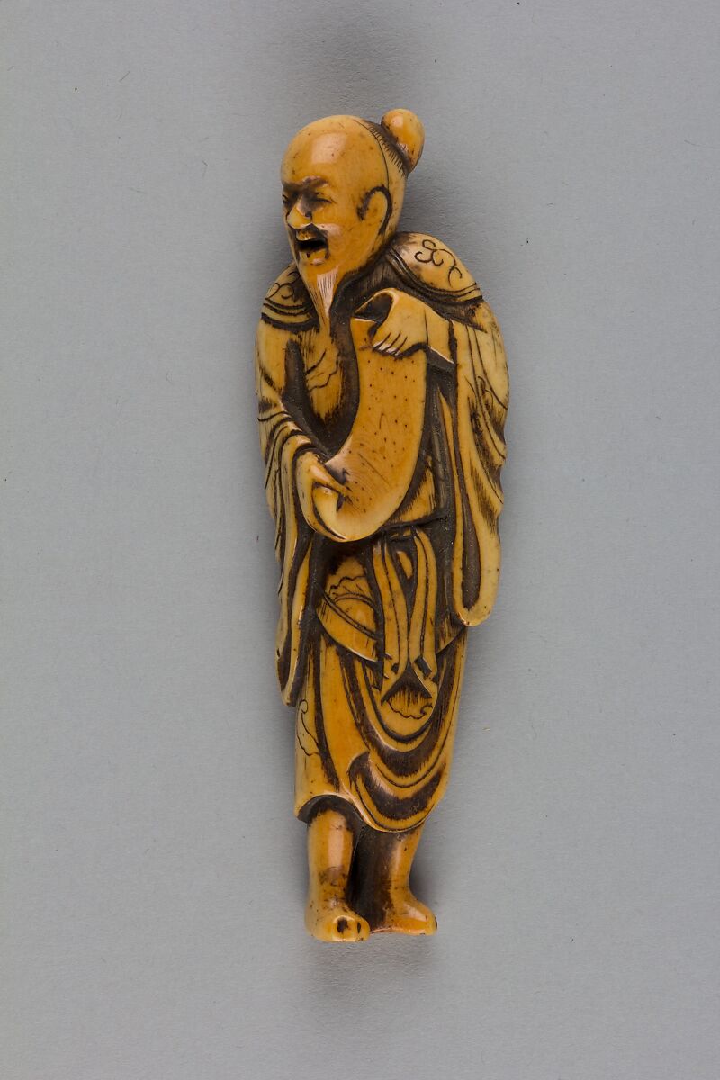 Netsuke of Man Holding a Scroll, Ivory, Japan 