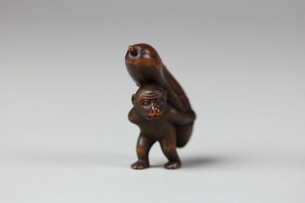 Netsuke of Monkey Carrying a Cucumber on His Back, Wood, Japan 